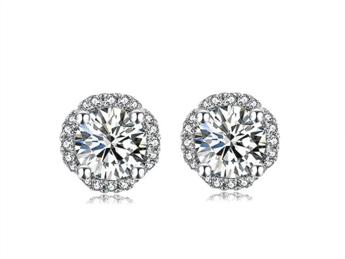Diamond stud earrings in martini settings, manufactured by Vesta Jewelry