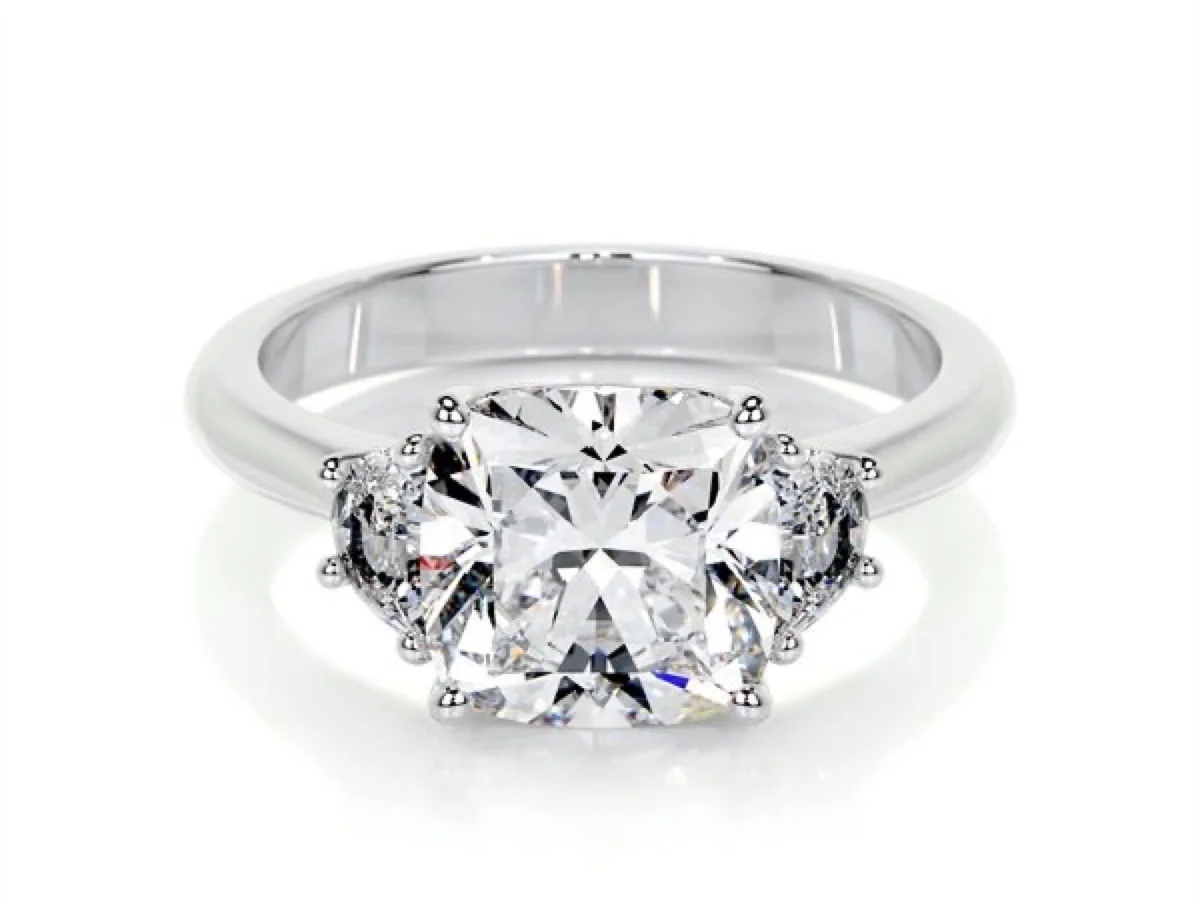 Three stone engagement ring with matched side stones, manufactured by Vesta Jewelry